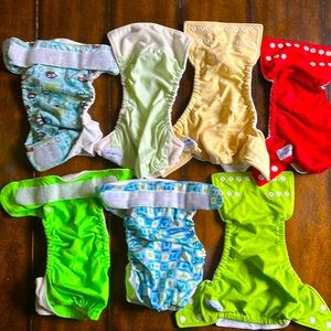 Lot of 7 pocket, one size cloth diapers. FuzziBunz and Happy Heinys.